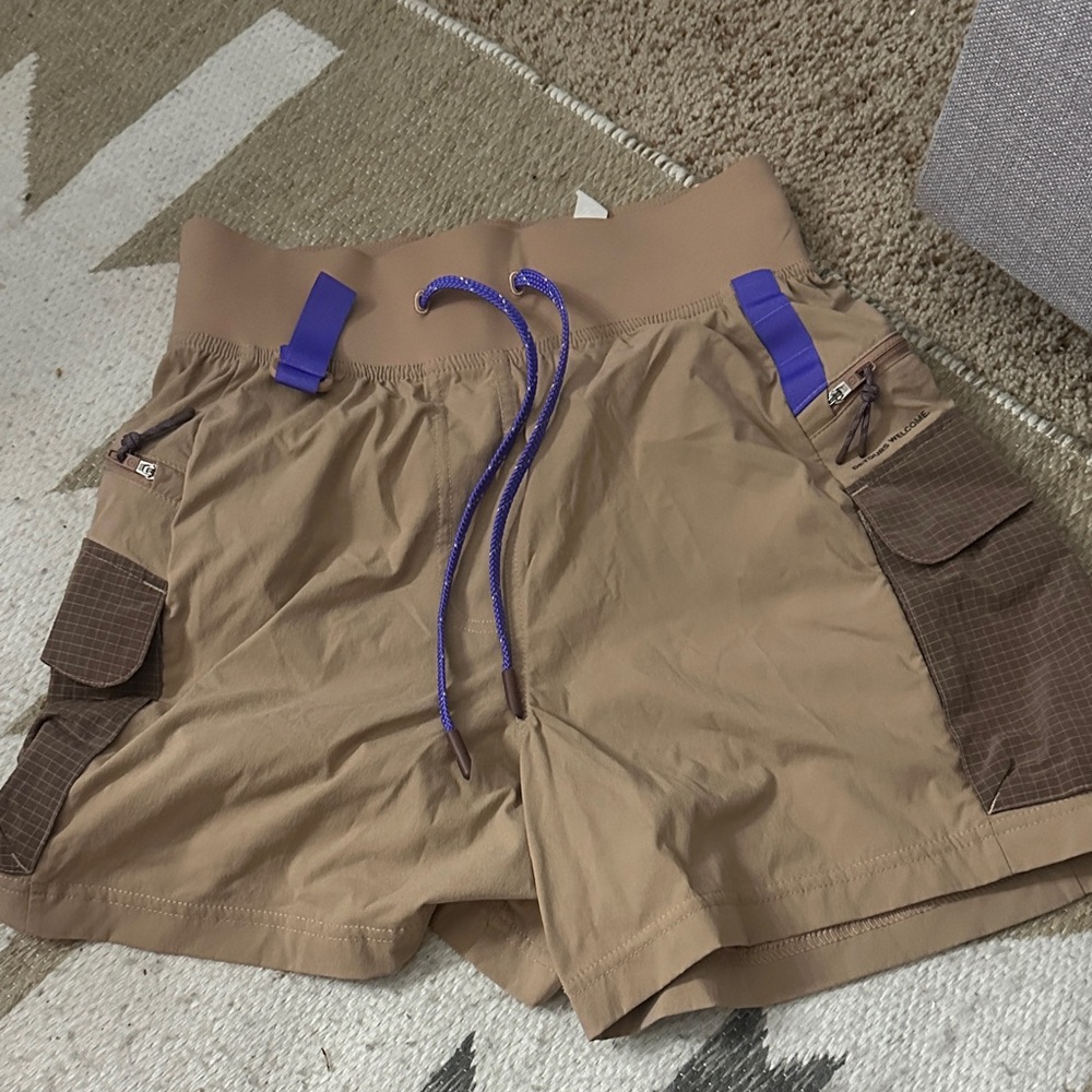 lululemon athletica Tan Athletic Shorts with Purple Drawcord and Accent Tabs